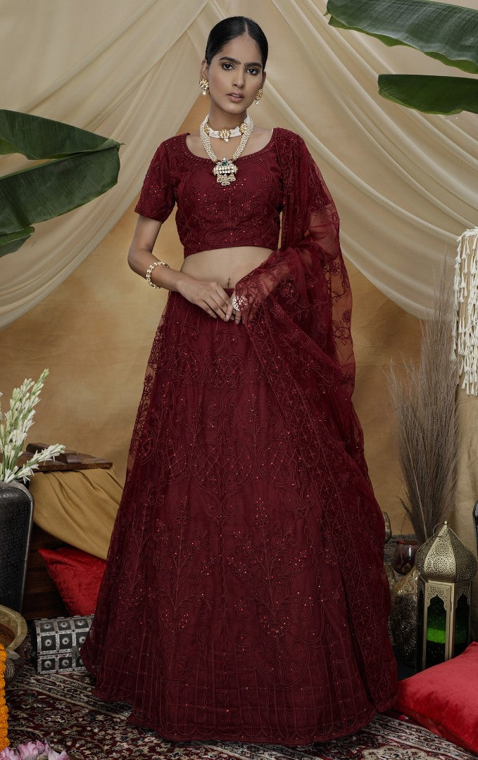 Maroon net heavy embroidered s wedding lehenga choli with koti