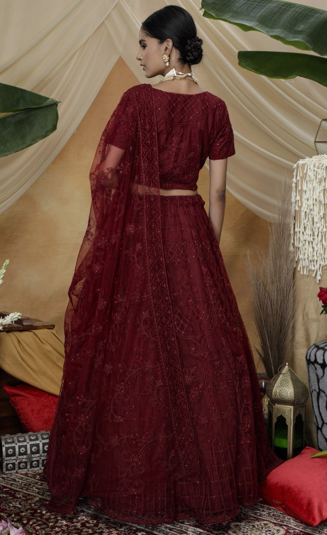Maroon net heavy embroidered s wedding lehenga choli with koti