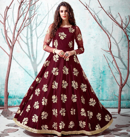 Maroon net metallic foil work party wear designer gown