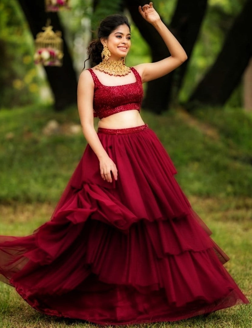 Maroon net sequence embroidery party wear lehenga choli
