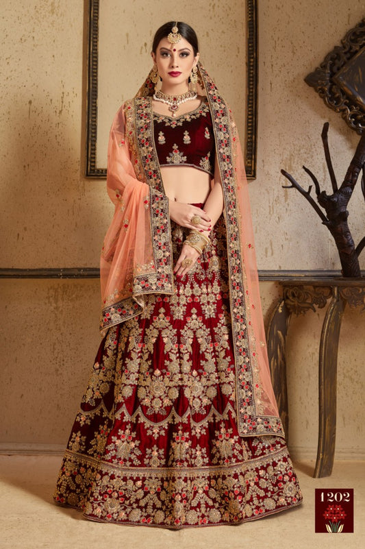 Maroon pure velvet designer heavy embroidered bridal lehenga