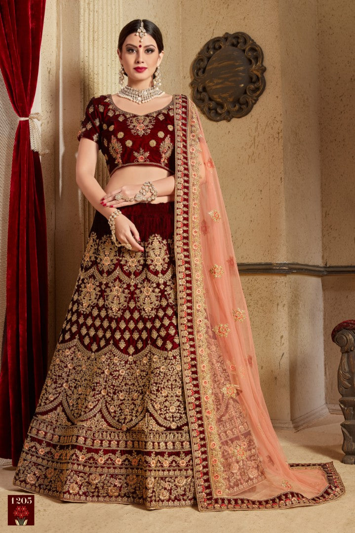 Maroon pure velvet designer heavy embroidered bridal lehenga