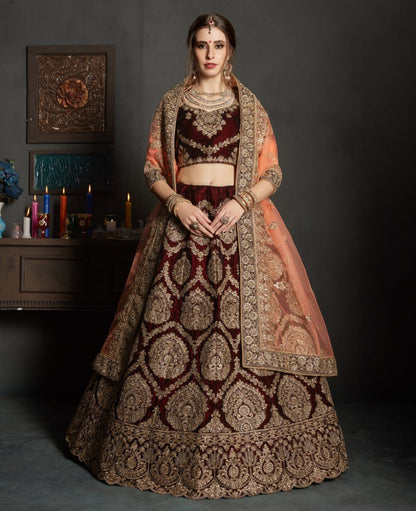 maroon pure velvet designer heavy embroidered bridal lehenga