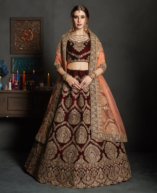 maroon pure velvet designer heavy embroidered bridal lehenga