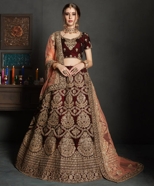 maroon pure velvet designer heavy embroidered bridal lehenga