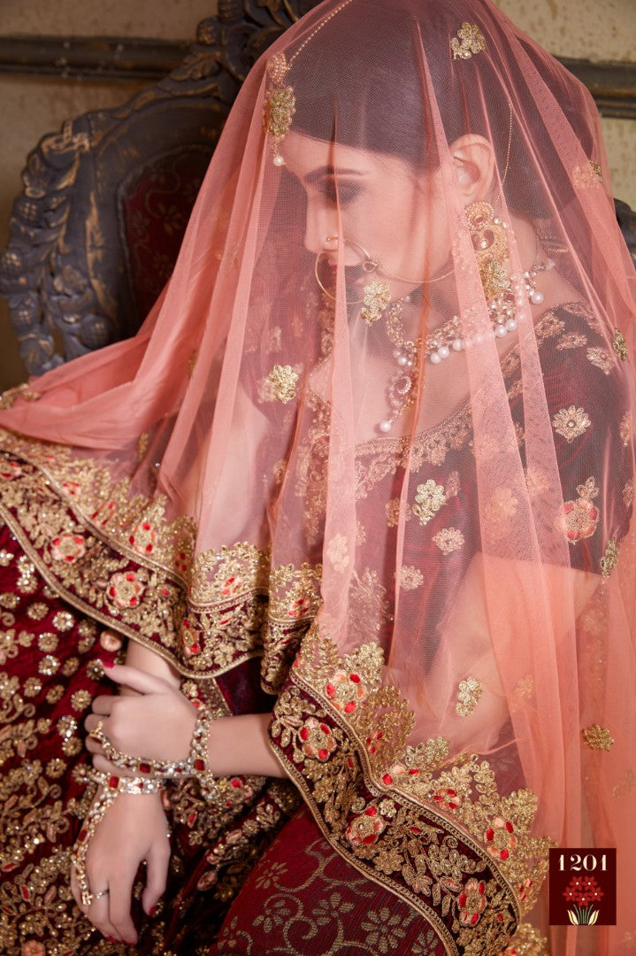 Maroon pure velvet designer heavy embroidered bridal lehenga