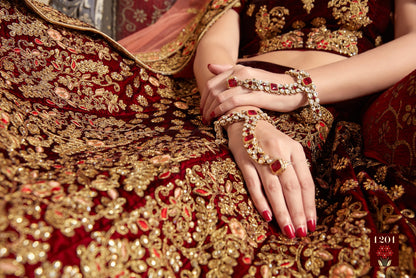 Maroon pure velvet designer heavy embroidered bridal lehenga