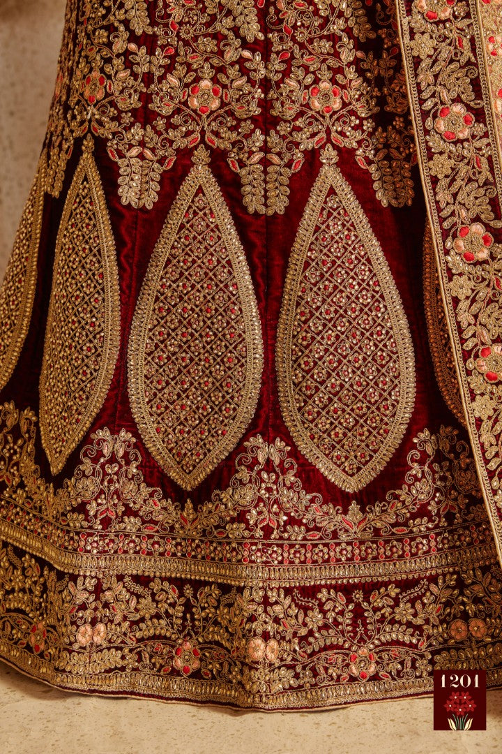 Maroon pure velvet designer heavy embroidered bridal lehenga
