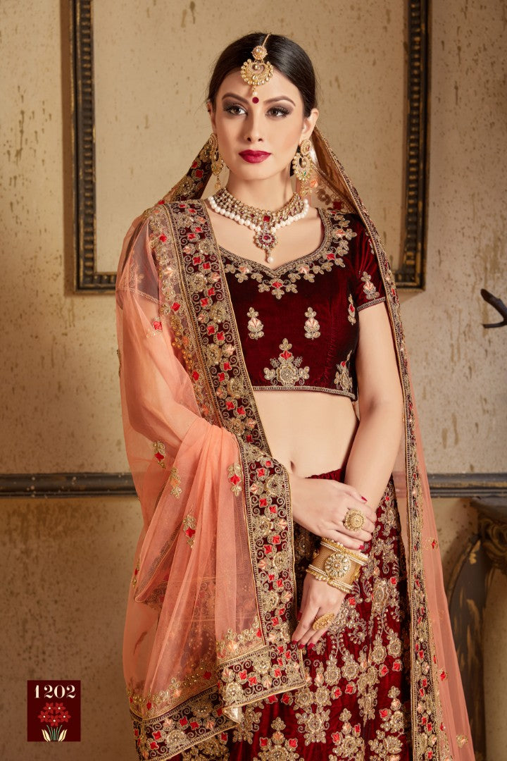 Maroon pure velvet designer heavy embroidered bridal lehenga