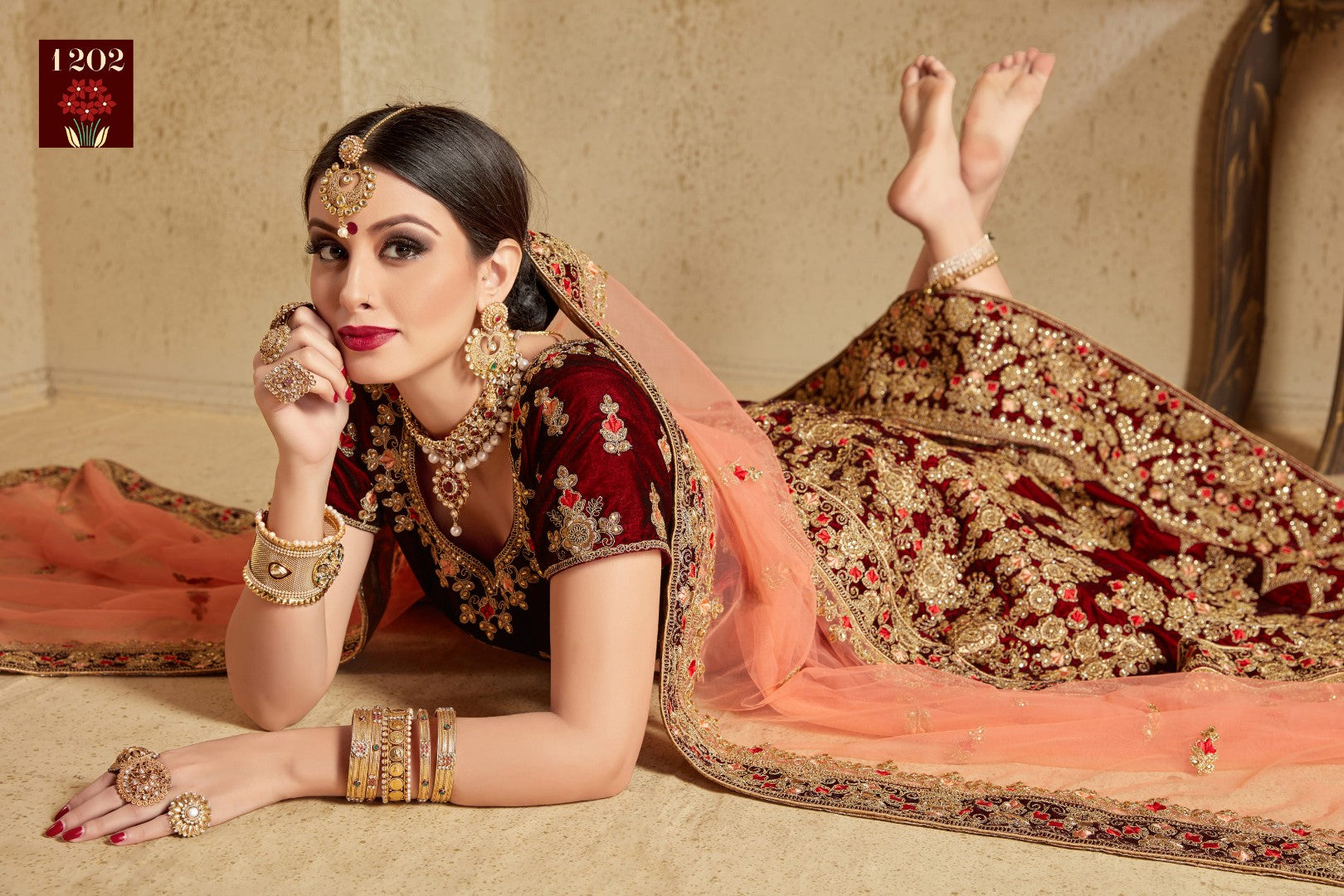 Maroon pure velvet designer heavy embroidered bridal lehenga