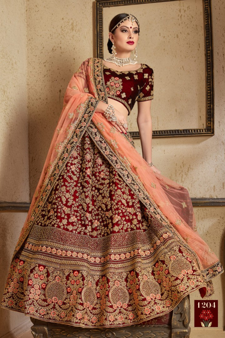 Maroon pure velvet designer heavy embroidered bridal lehenga