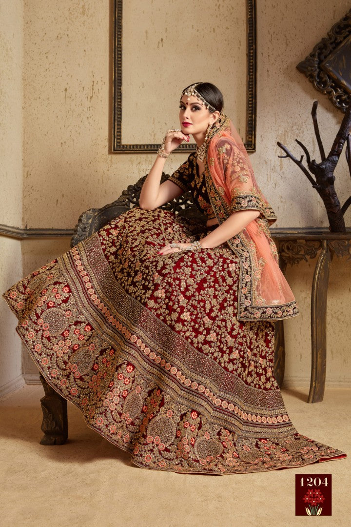 Maroon pure velvet designer heavy embroidered bridal lehenga