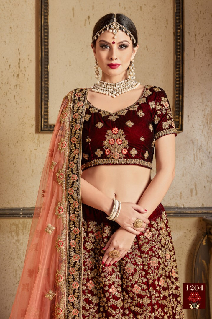 Maroon pure velvet designer heavy embroidered bridal lehenga