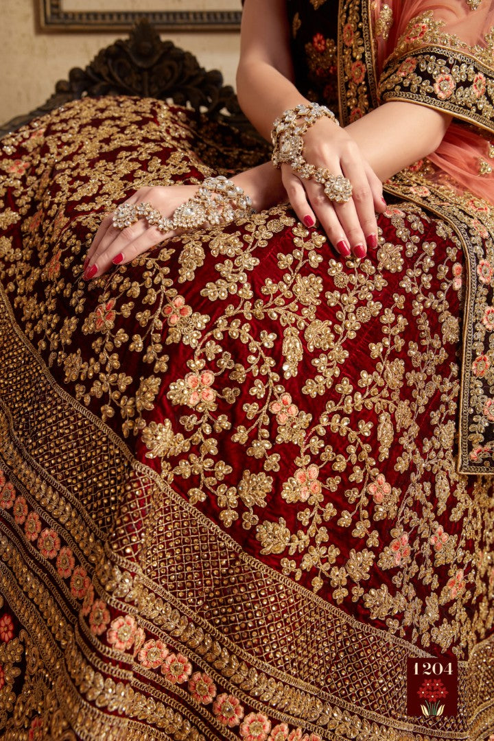 Maroon pure velvet designer heavy embroidered bridal lehenga