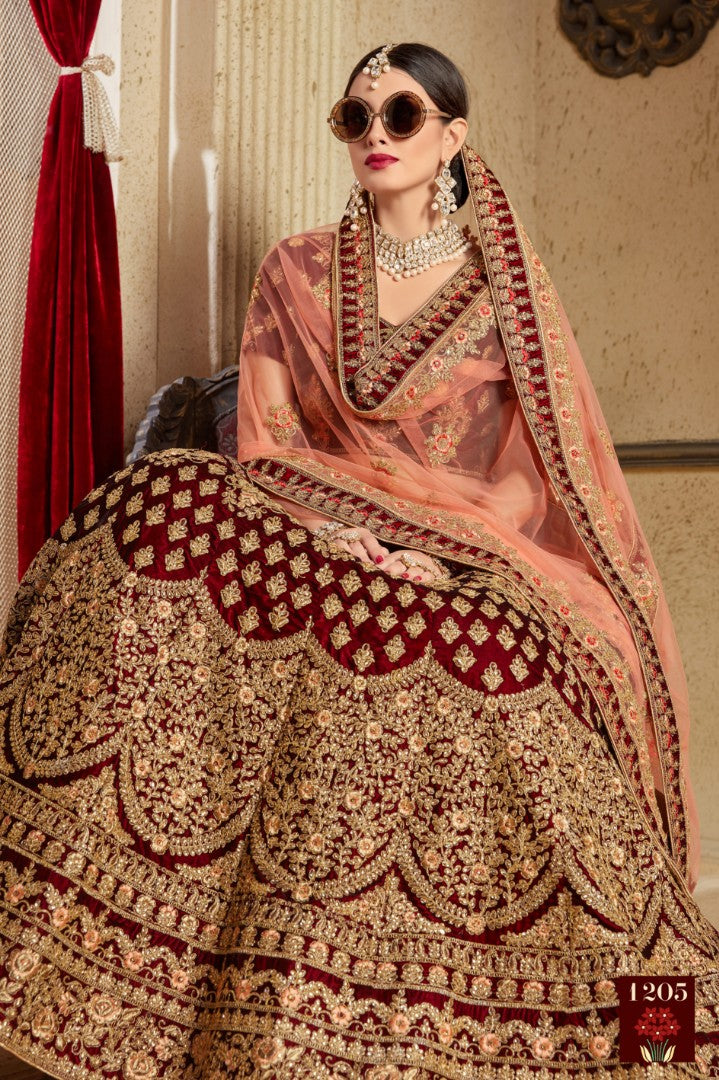 Maroon pure velvet designer heavy embroidered bridal lehenga