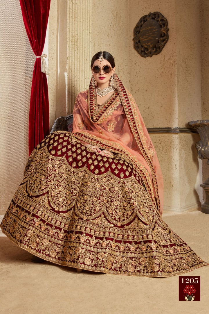 Maroon pure velvet designer heavy embroidered bridal lehenga