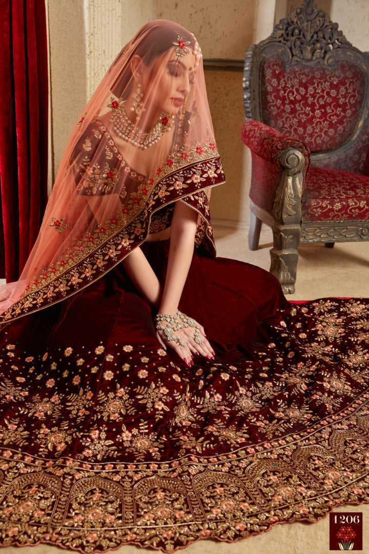 Maroon pure velvet designer heavy embroidered bridal lehenga