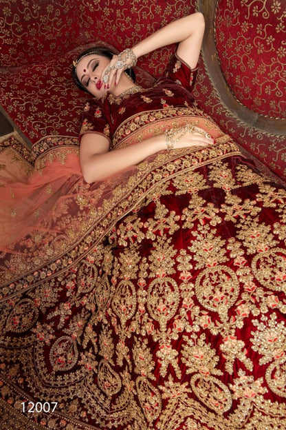 Maroon pure velvet designer heavy embroidered bridal lehenga