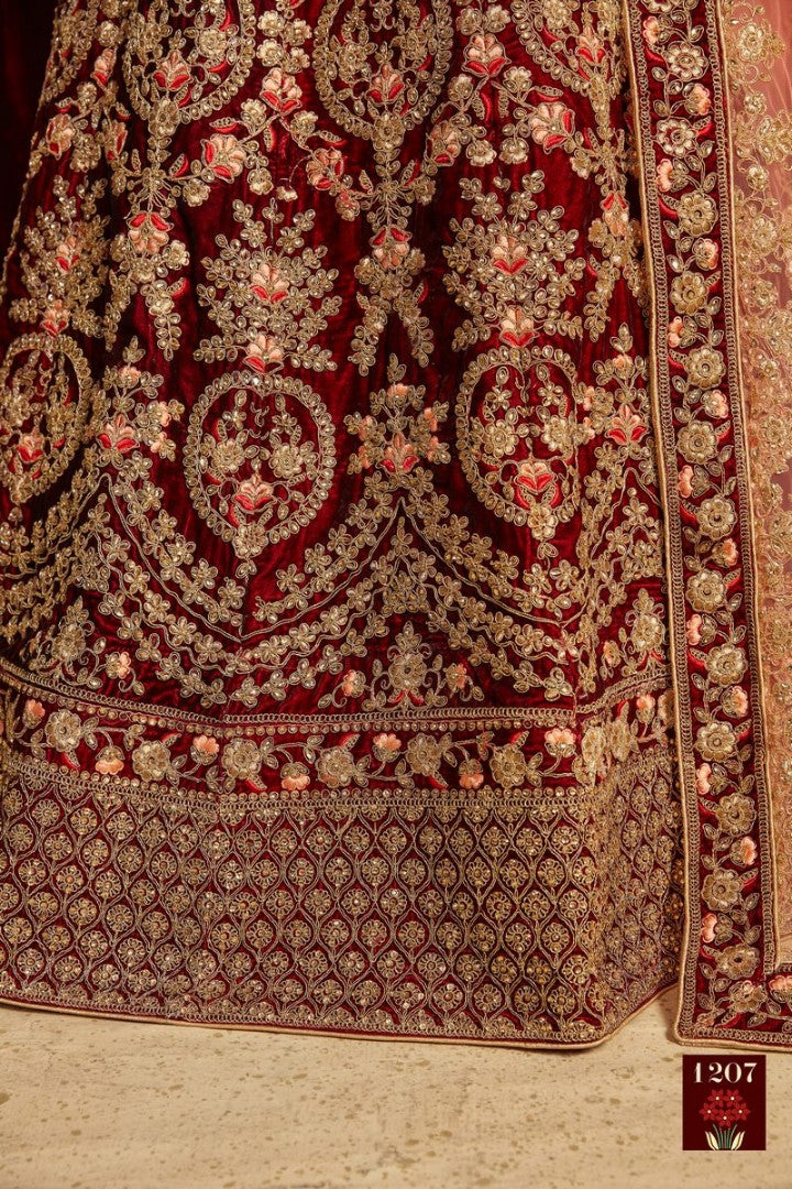 Maroon pure velvet designer heavy embroidered bridal lehenga