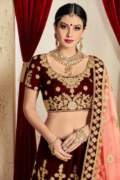Maroon pure velvet designer heavy embroidered bridal lehenga