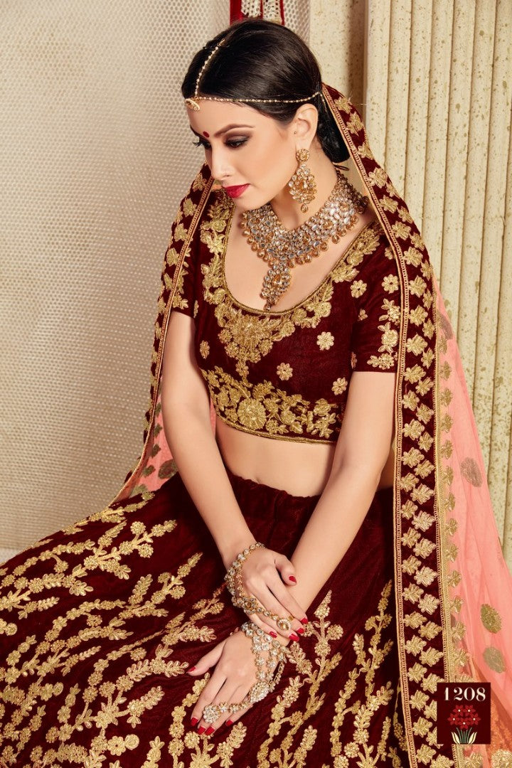 Maroon pure velvet designer heavy embroidered bridal lehenga