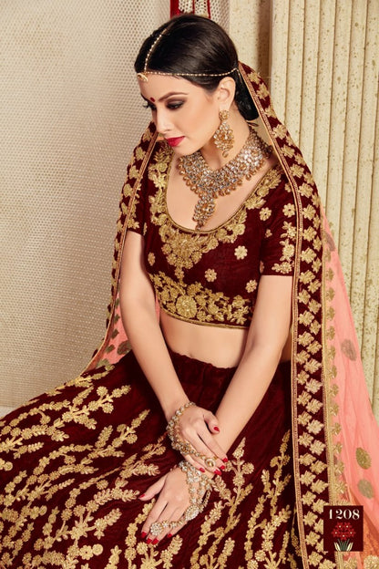 Maroon pure velvet designer heavy embroidered bridal lehenga