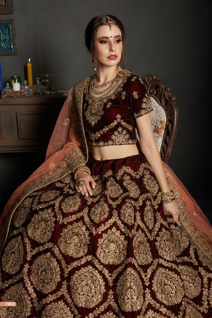 maroon pure velvet designer heavy embroidered bridal lehenga