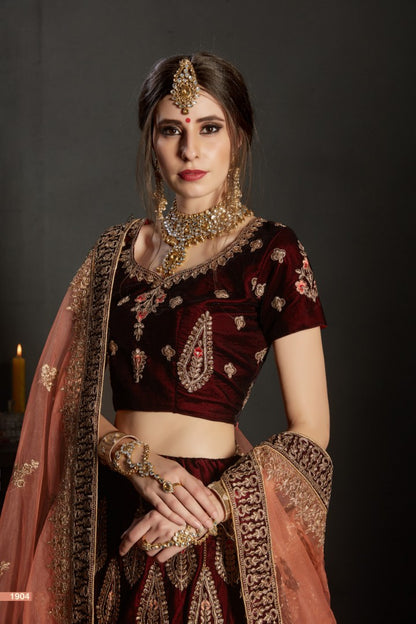 maroon pure velvet designer heavy embroidered bridal lehenga