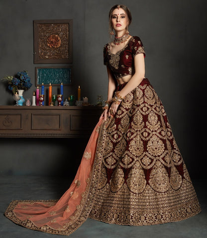 maroon pure velvet designer heavy embroidered bridal lehenga