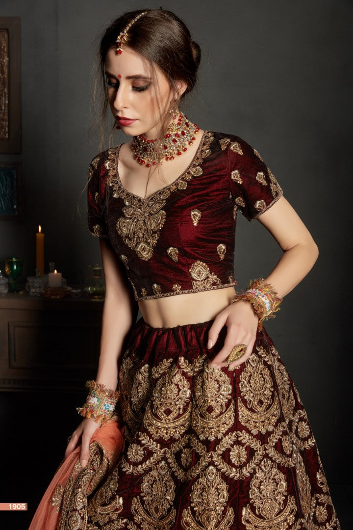 maroon pure velvet designer heavy embroidered bridal lehenga
