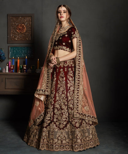 maroon pure velvet designer heavy embroidered bridal lehenga