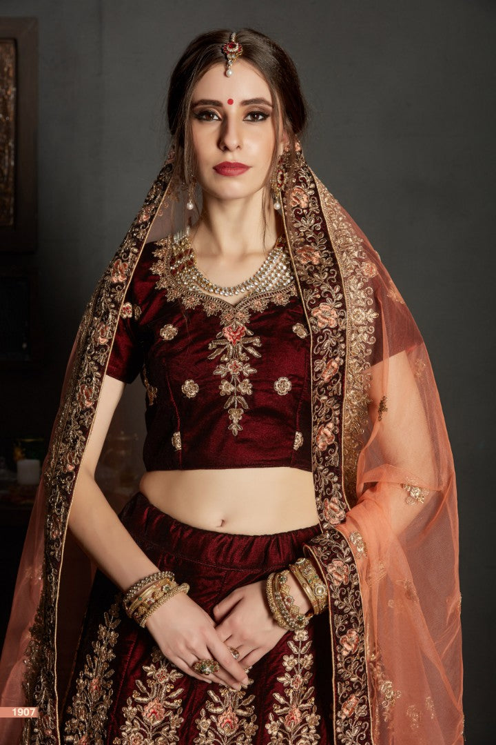 maroon pure velvet designer heavy embroidered bridal lehenga