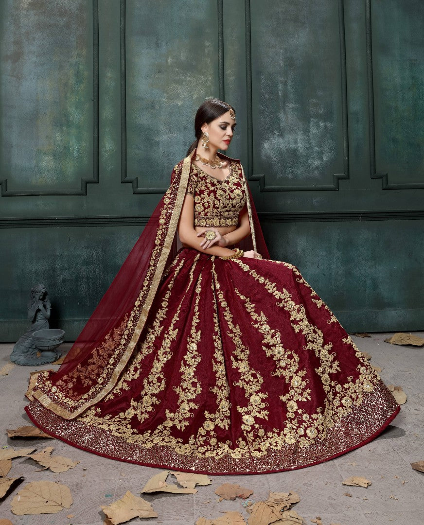 Maroon raw silk heavy dori and sequence work wedding lehenga