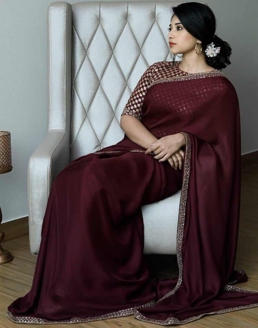 Maroon satin georgette sequence work lace border saree