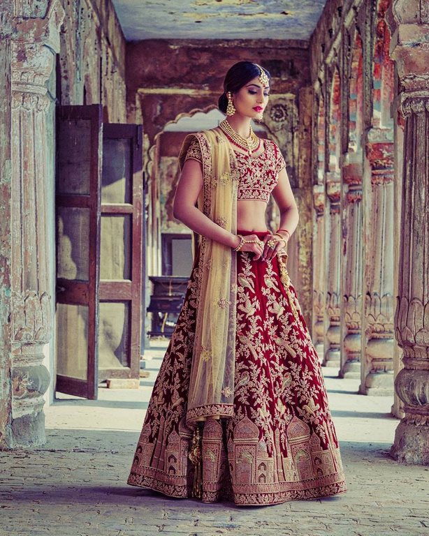 Maroon velvet heavy embroidered bridal lehenga