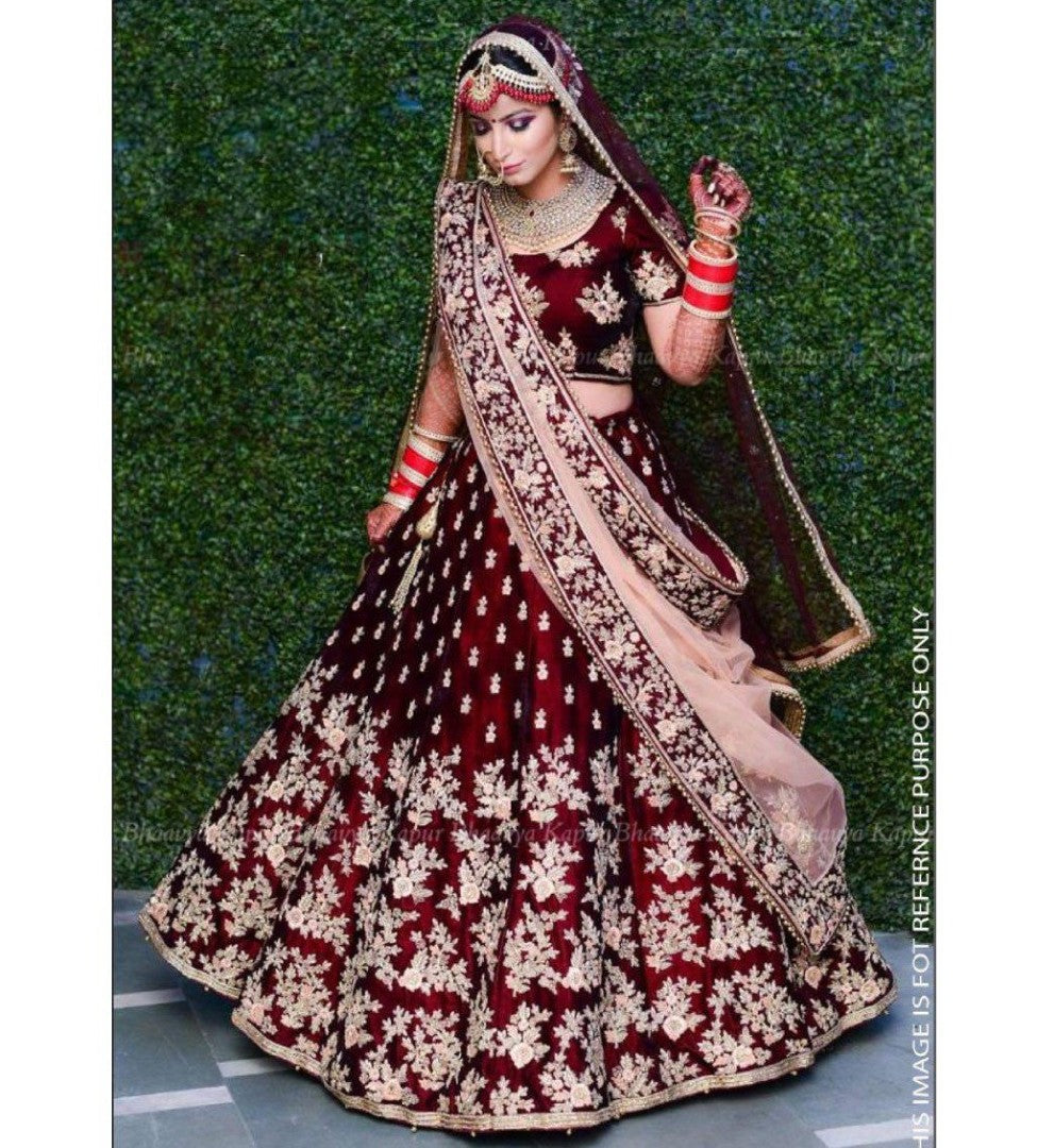 Maroon velvet heavy embroidered bridal lehenga