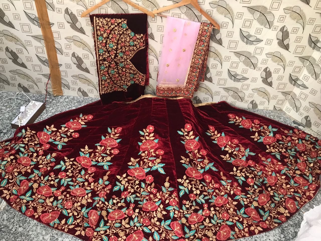 maroon velvet heavy embroidered bridal lehenga