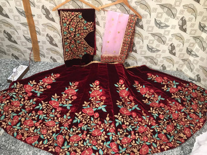 maroon velvet heavy embroidered bridal lehenga