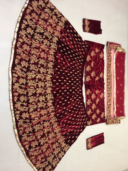 Maroon velvet heavy embroidered bridal lehenga