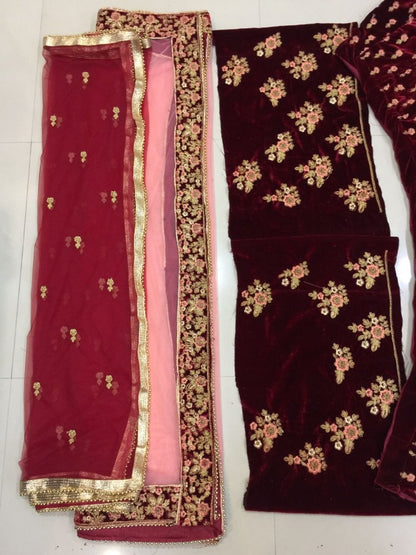 Maroon velvet heavy embroidered bridal lehenga