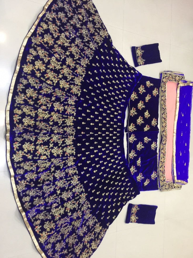 Maroon velvet heavy embroidered bridal lehenga