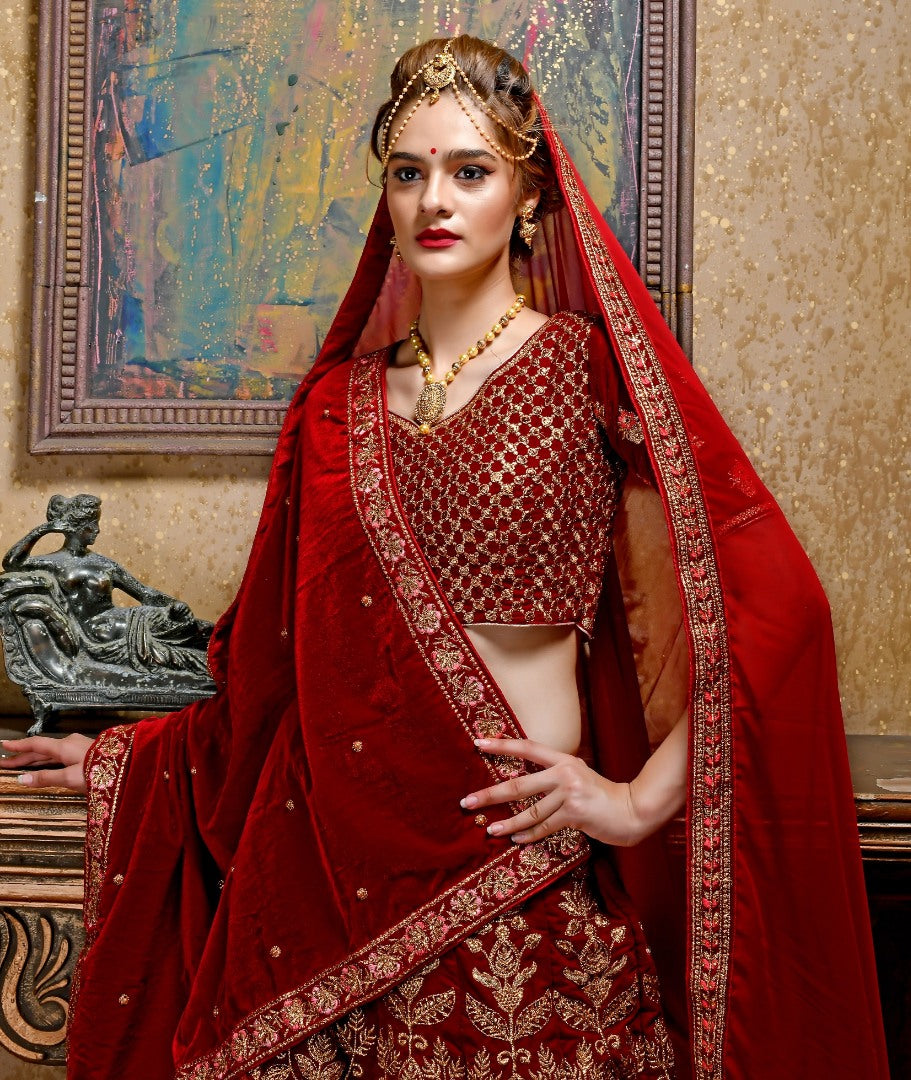 Maroon velvet heavy embroidered bridal lehenga choli