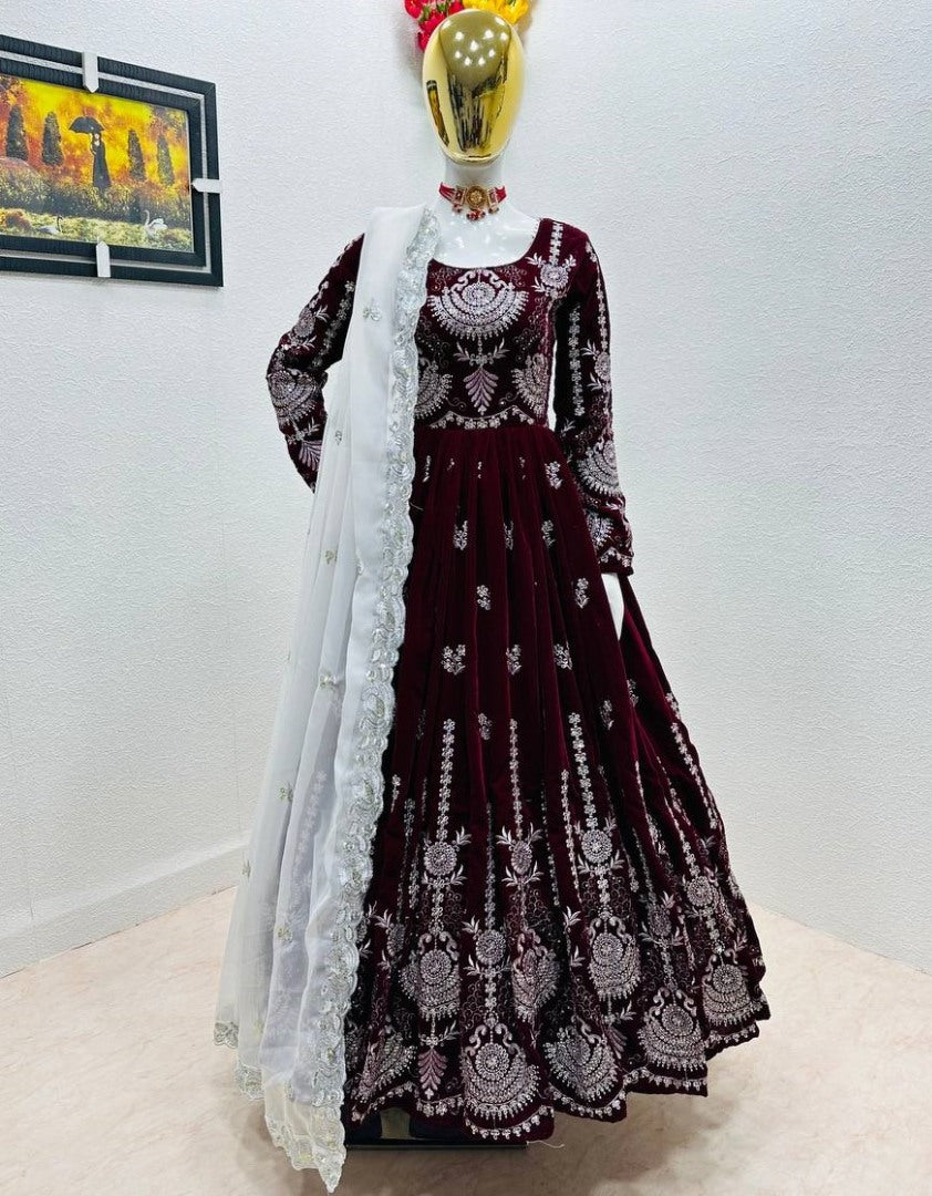 Maroon velvet heavy embroidery worked wedding gown