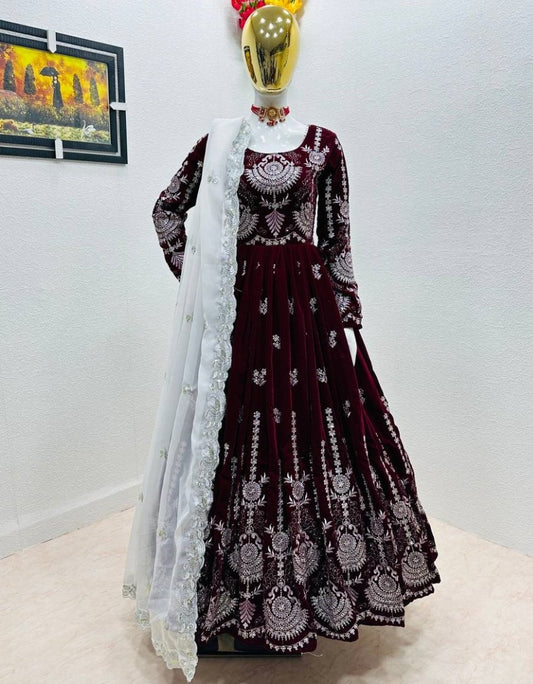 Maroon velvet heavy embroidery worked wedding gown
