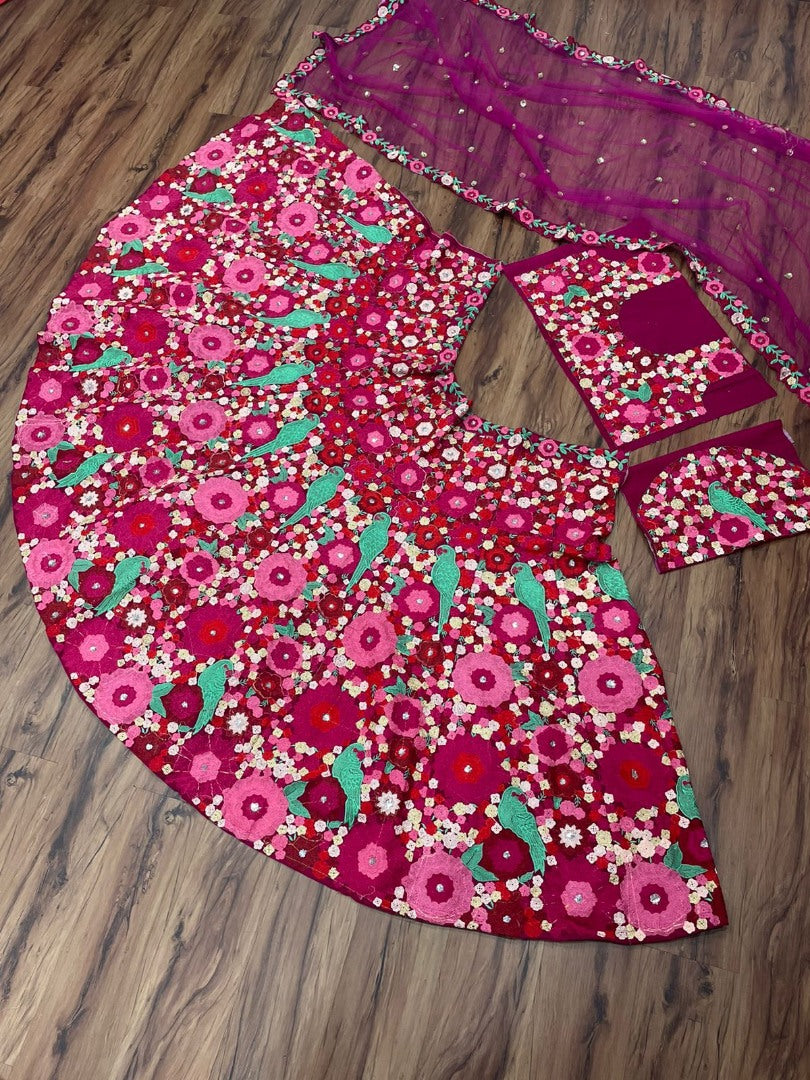 Maroon velvet tapeta heavy embroidered wedding lehenga choli