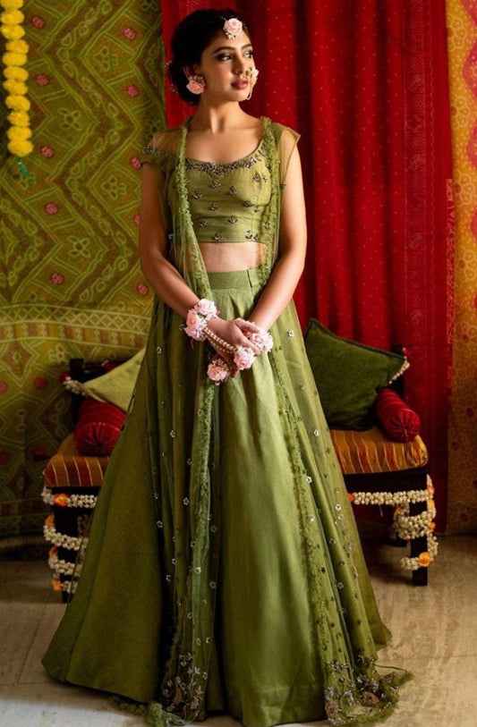 Mehendi green zurich silk sequence and zari work ceremonial lehenga choli with koti
