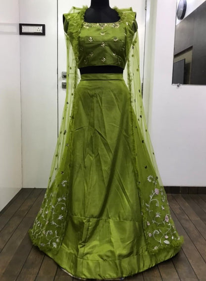 Mehendi green zurich silk sequence and zari work ceremonial lehenga choli with koti