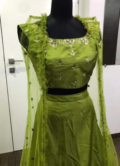 Mehendi green zurich silk sequence and zari work ceremonial lehenga choli with koti