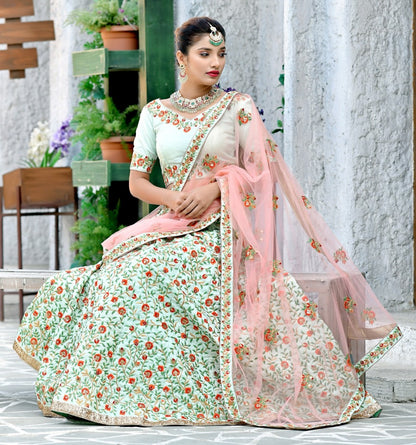 Mint green silk heavy multi thread embroidery worked wedding lehenga
