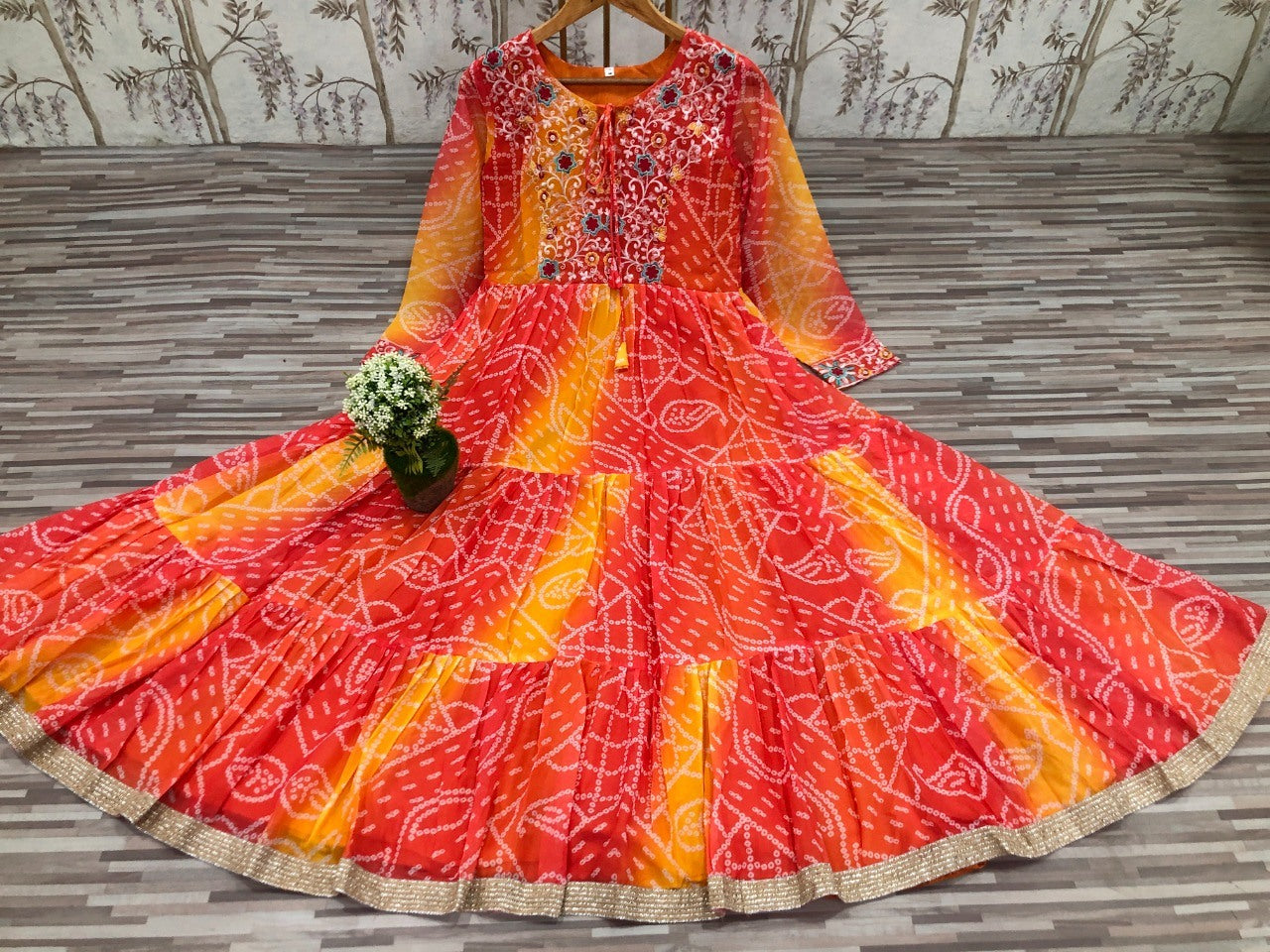 Multi shade orange georgette bandhni printed gown